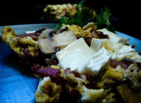 musrhoom bacon brie eggs served